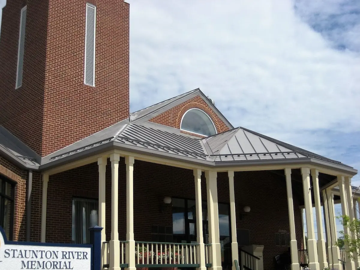 Skilled roofing craftsmen working on a residential roof in Leonardtown